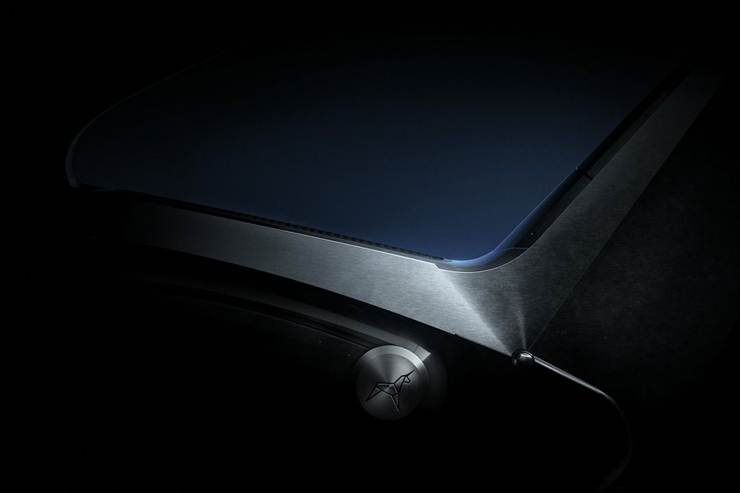 Close detail of a curved folded steel body panel